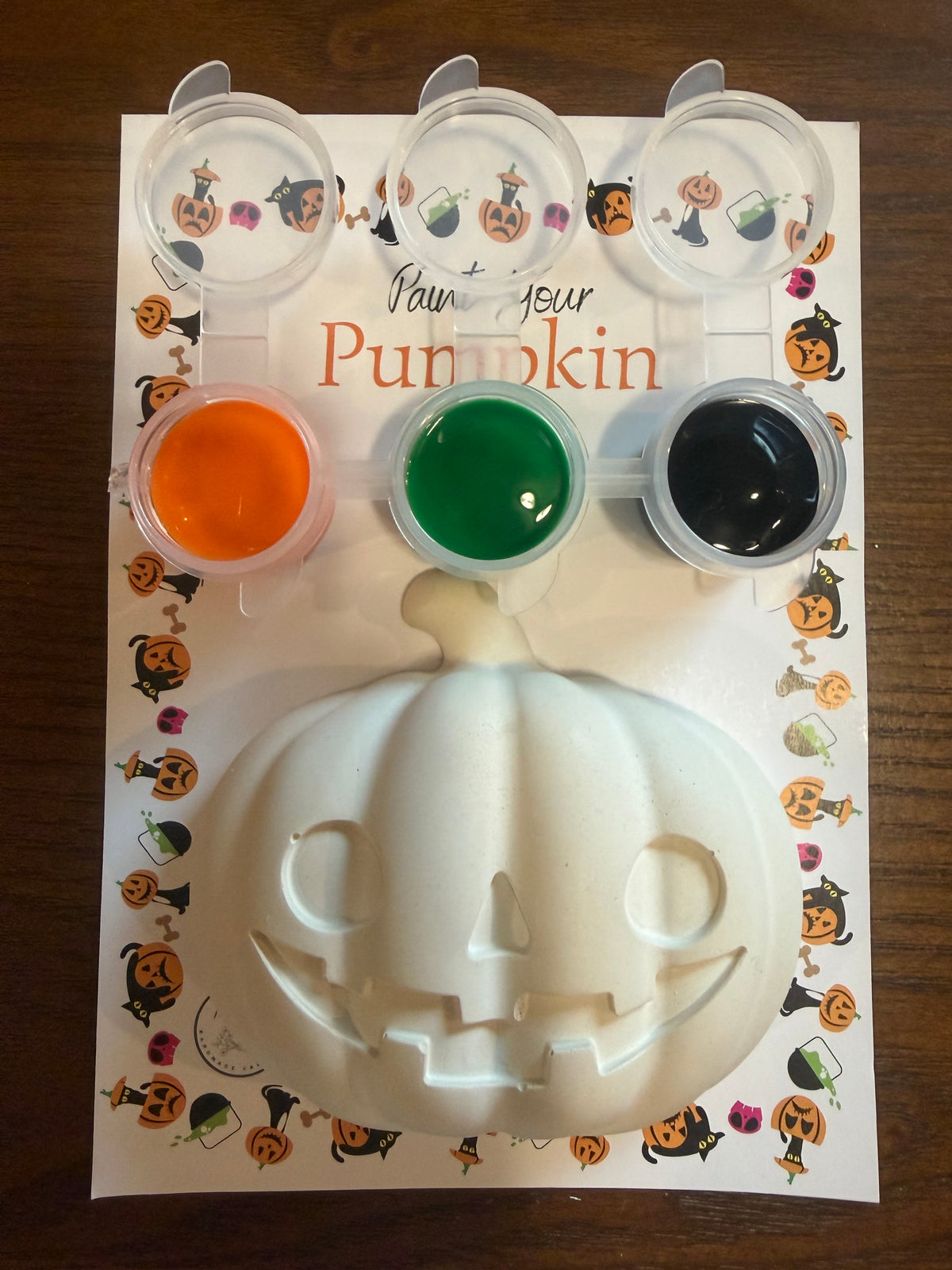 Paint Your Pumpkin Kit with handmade plaster jack-o-lantern and 3 paints in orange, green, and black by Created by Madison